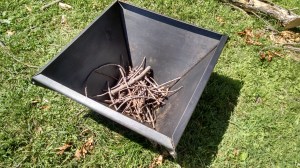 Start the fire using twigs and small kindling.